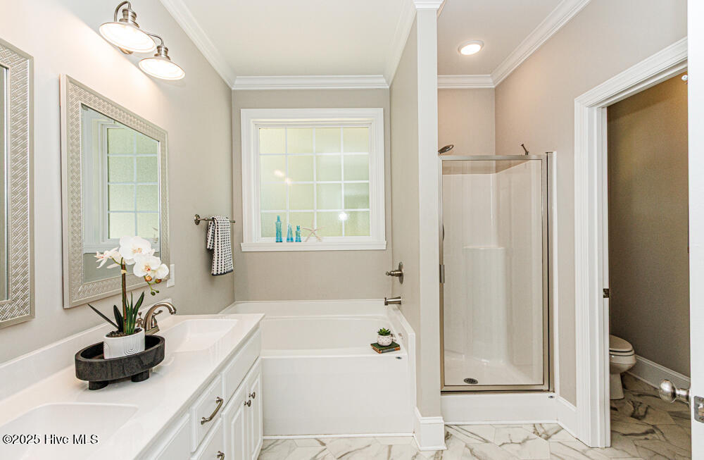 8700 Commercial Road Elm City, NC 27822 - Photo 33 of 73 Primary bathroom has soaking tub as well as separate shower.