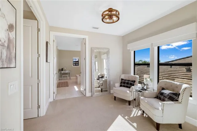 a kitchen with a sink and a refrigerator