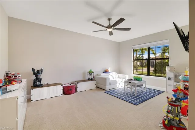 a living room with furniture and window