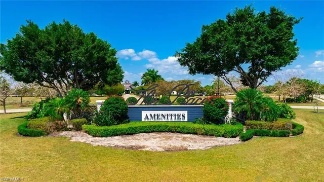 an aerial view of a house with a lake view