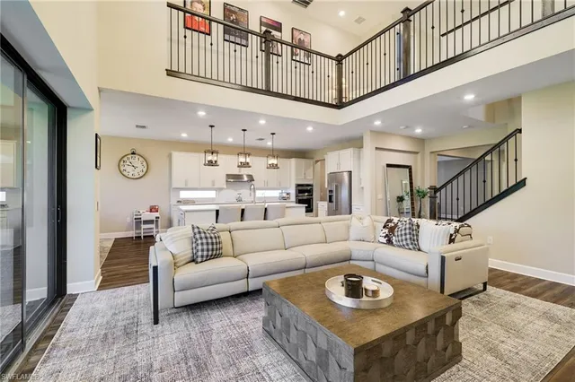 a living room with furniture and a table