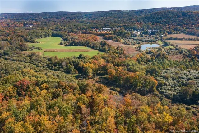 an aerial view of residential house with outdoor space