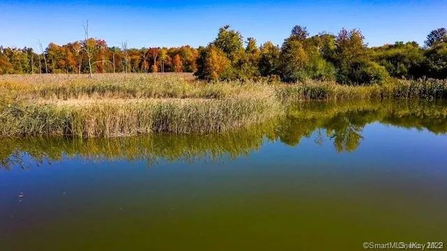 a view of lake and houses with outdoor space