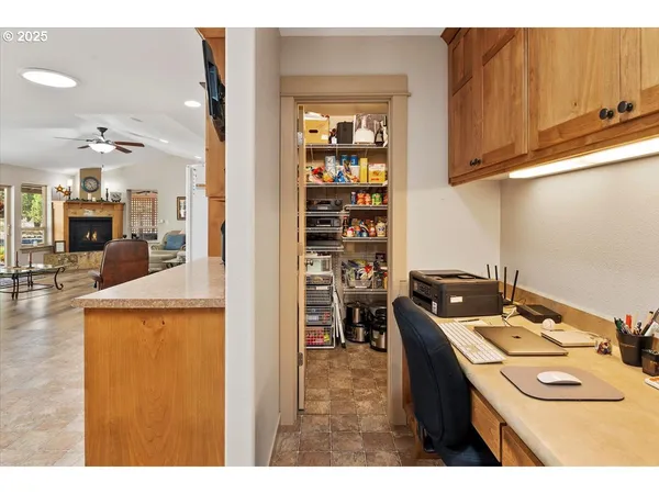 a kitchen that has a sink and a stove