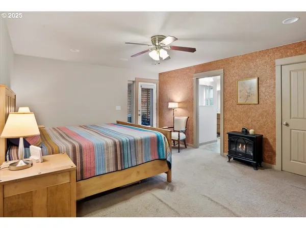 a bed room with a bed and a chandelier