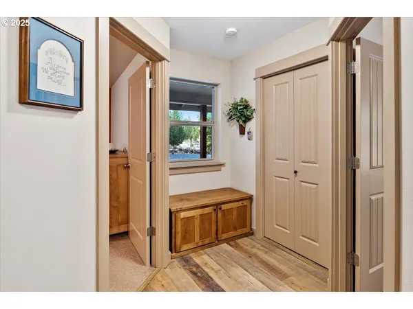 a view of a hallway and interior of house