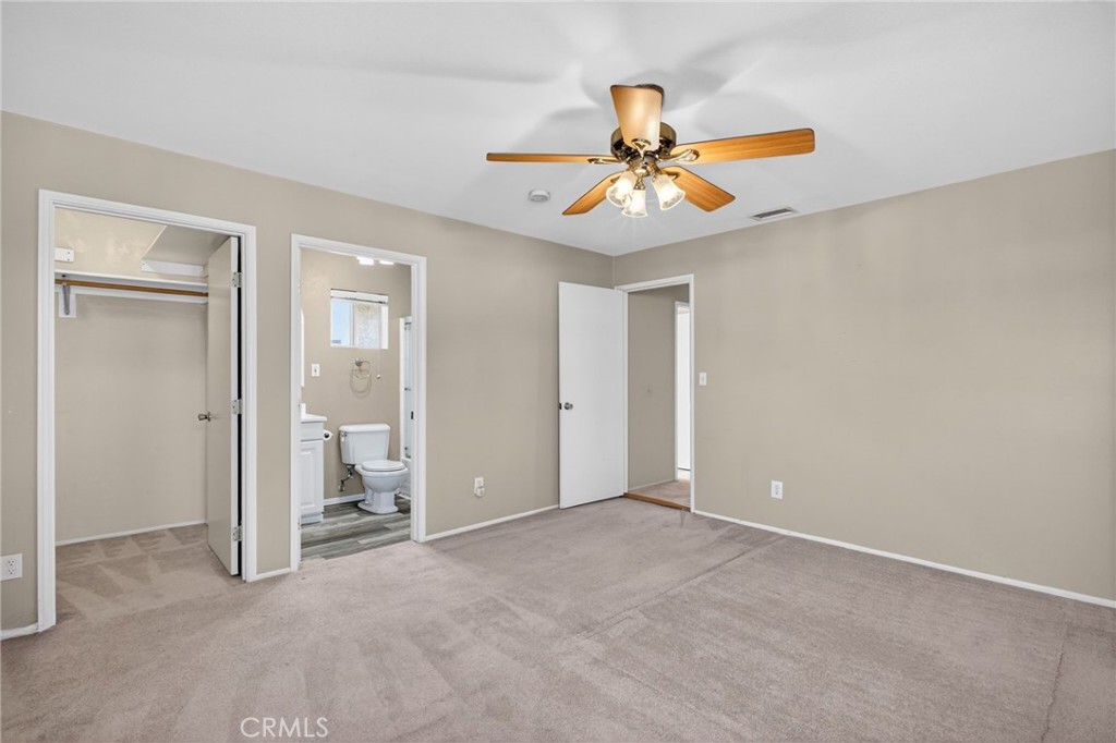2418 Rainbow Lane Brea, CA 92821 - Photo 21 of 33 Primary Walk-in Closet & full Bathroom