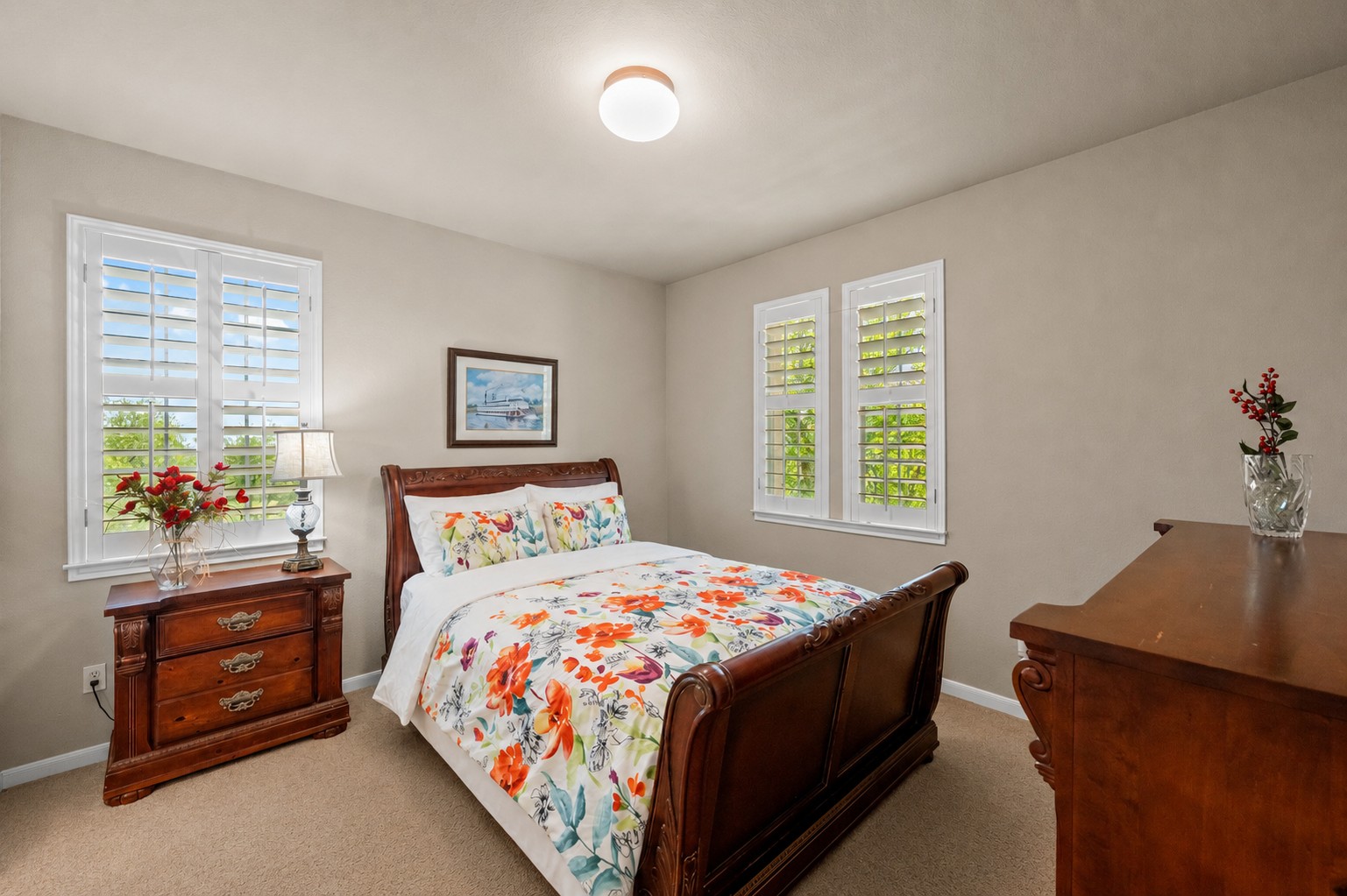 14608 Spillman Ranch Loop Austin, TX 78738 - Photo 23 of 31 a bedroom with a bed and a window