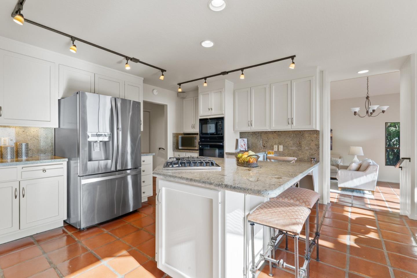 925 Skyward Drive Aptos, CA 95003 - Photo 20 of 95 a kitchen with stainless steel appliances cabinets a sink and a counter top space