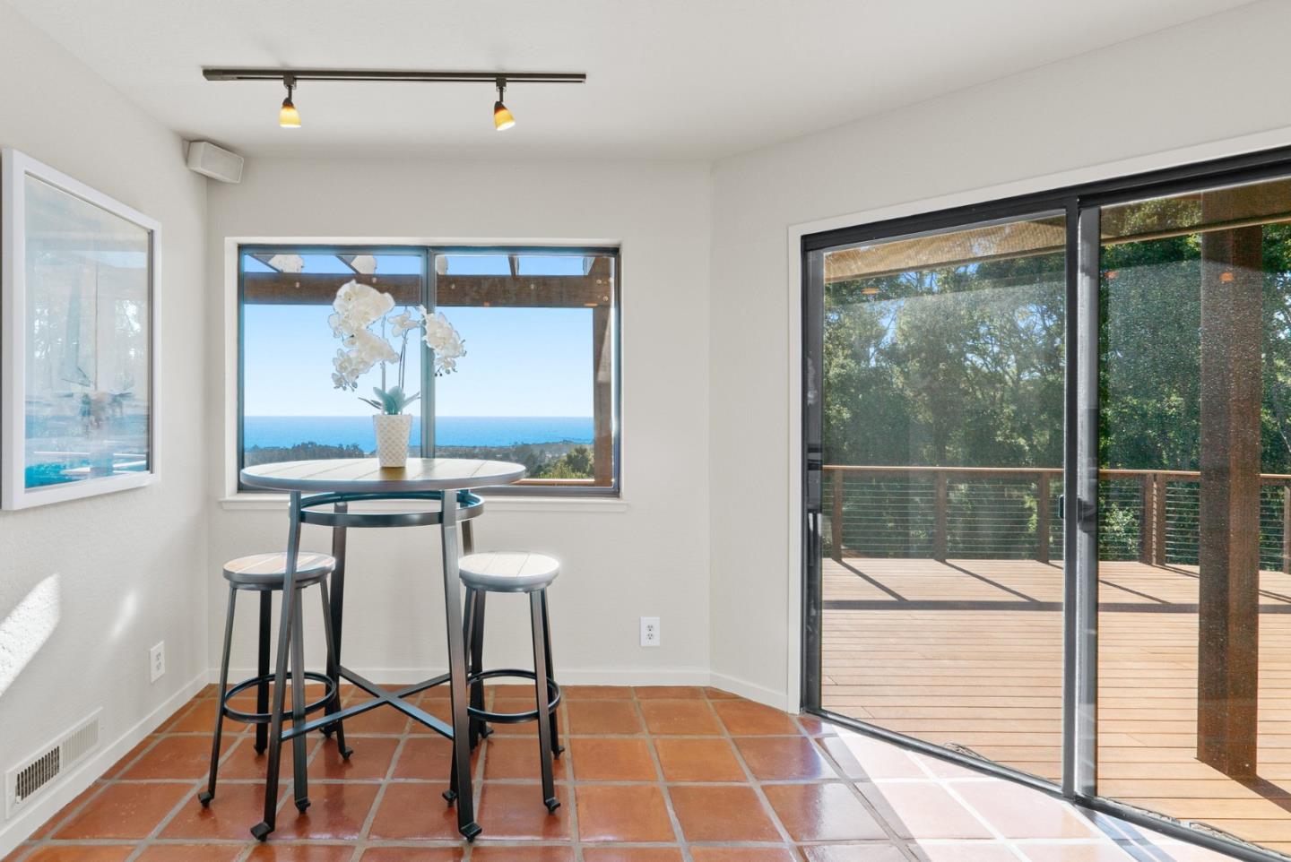 925 Skyward Drive Aptos, CA 95003 - Photo 22 of 95 a dining room with wooden floor and a table