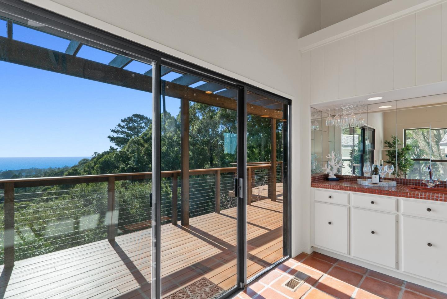 925 Skyward Drive Aptos, CA 95003 - Photo 26 of 95 a view of a balcony with wooden floor and iron stairs