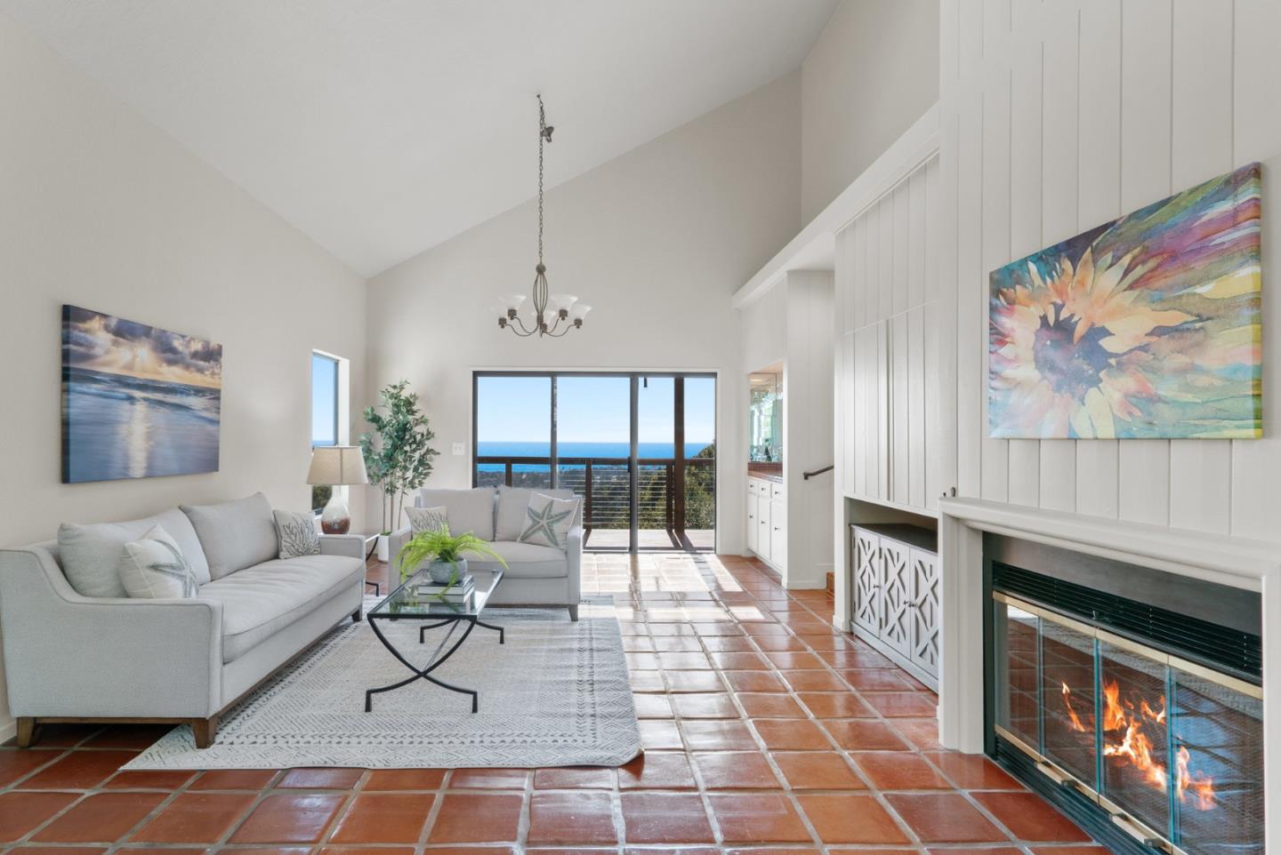 925 Skyward Drive Aptos, CA 95003 - Photo 27 of 95 a living room with furniture a fireplace and a flat screen tv