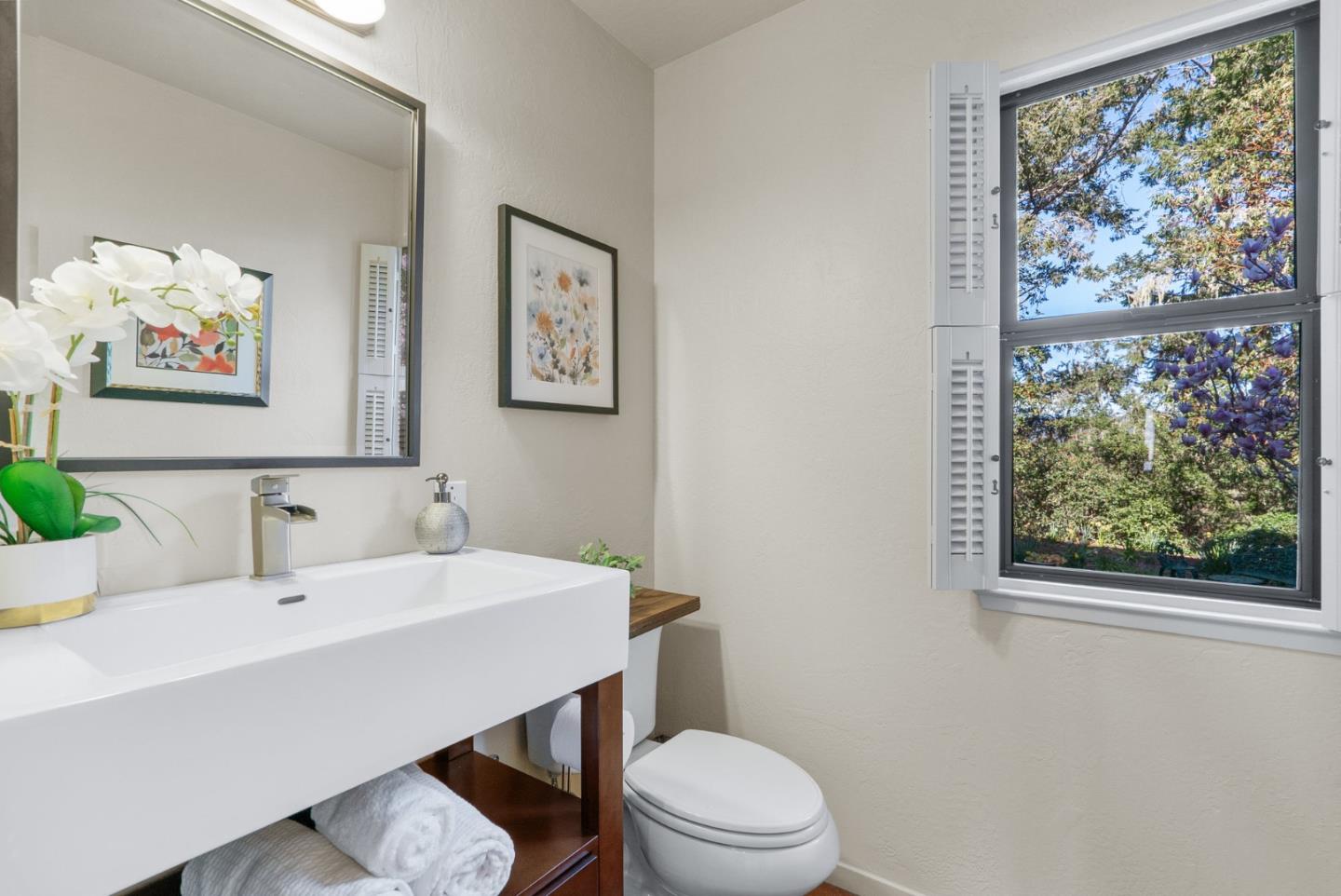 925 Skyward Drive Aptos, CA 95003 - Photo 31 of 95 a bathroom with a sink mirror and toilet