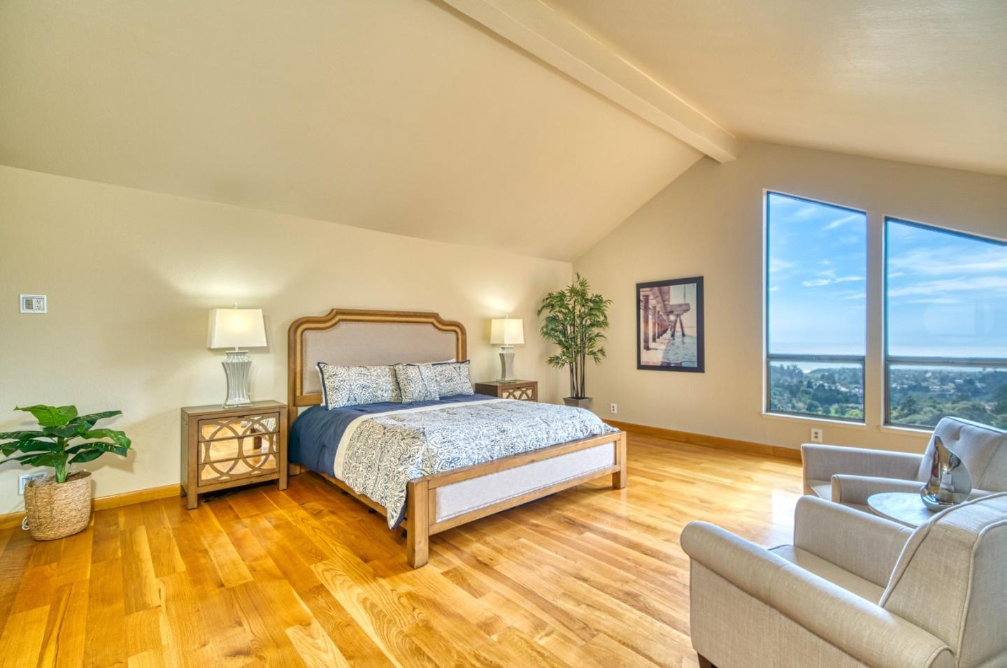 925 Skyward Drive Aptos, CA 95003 - Photo 51 of 95 a bedroom with a bed couch and a large window