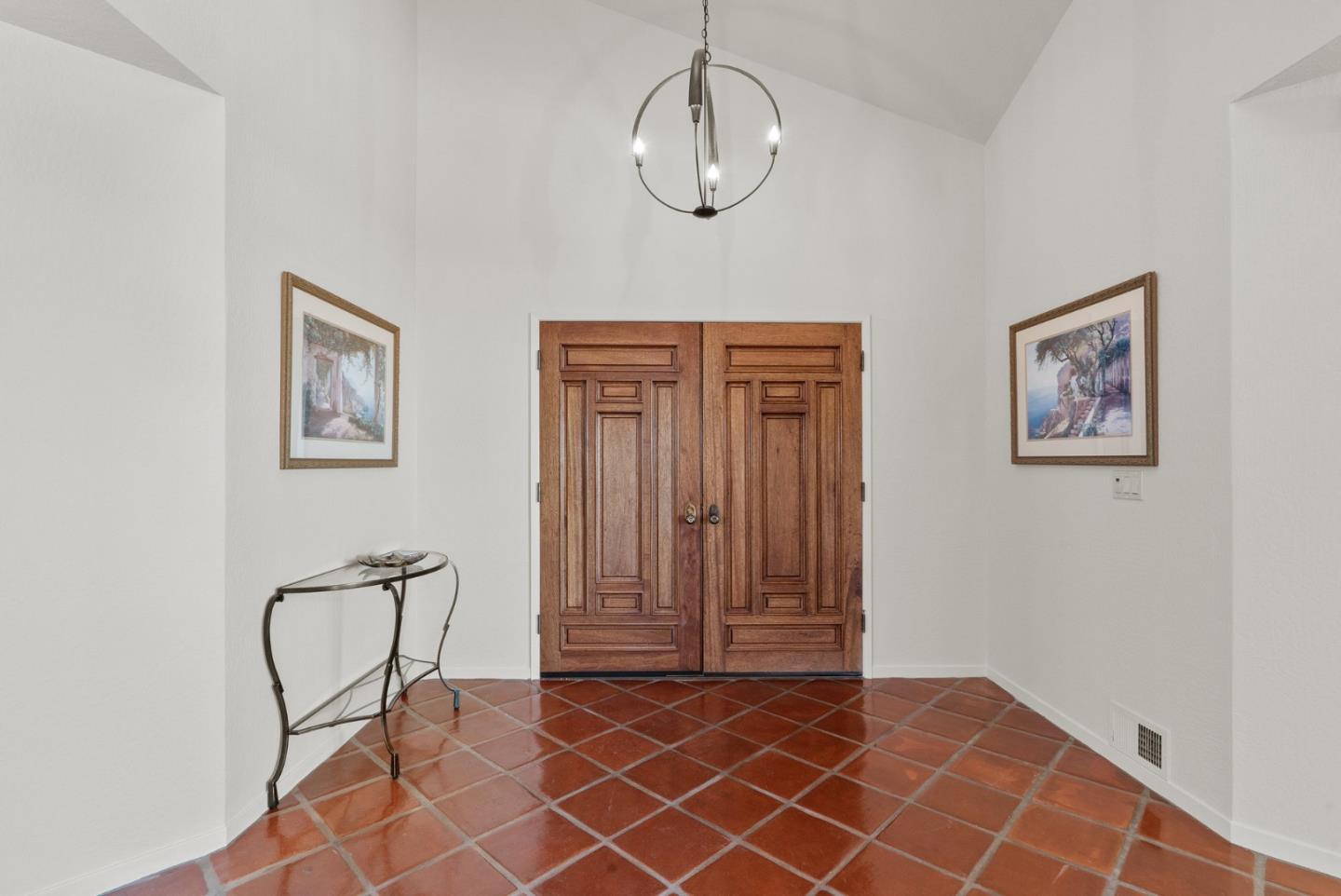925 Skyward Drive Aptos, CA 95003 - Photo 7 of 95 a view of a livingroom with wooden floor and a workspace