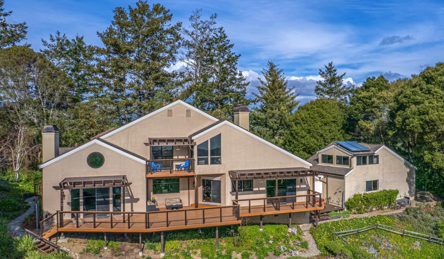 925 Skyward Drive Aptos, CA 95003 - Photo 74 of 95 a view of house with outdoor space and swimming pool