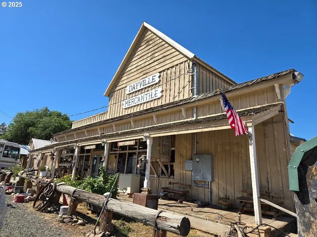 a view of a street with cars