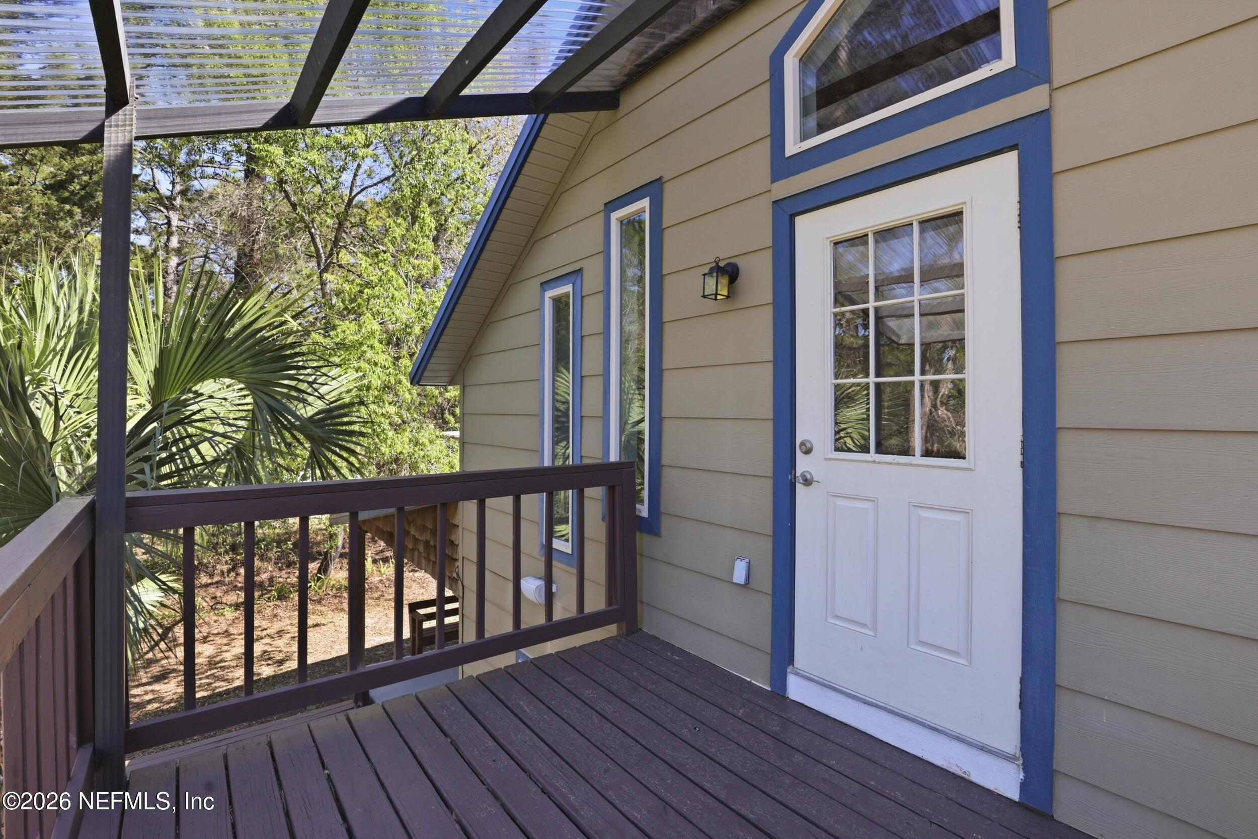 5714 Southeast 4th Avenue Keystone Heights, FL 32656 - Photo 32 of 53 a view of porch with wooden floor