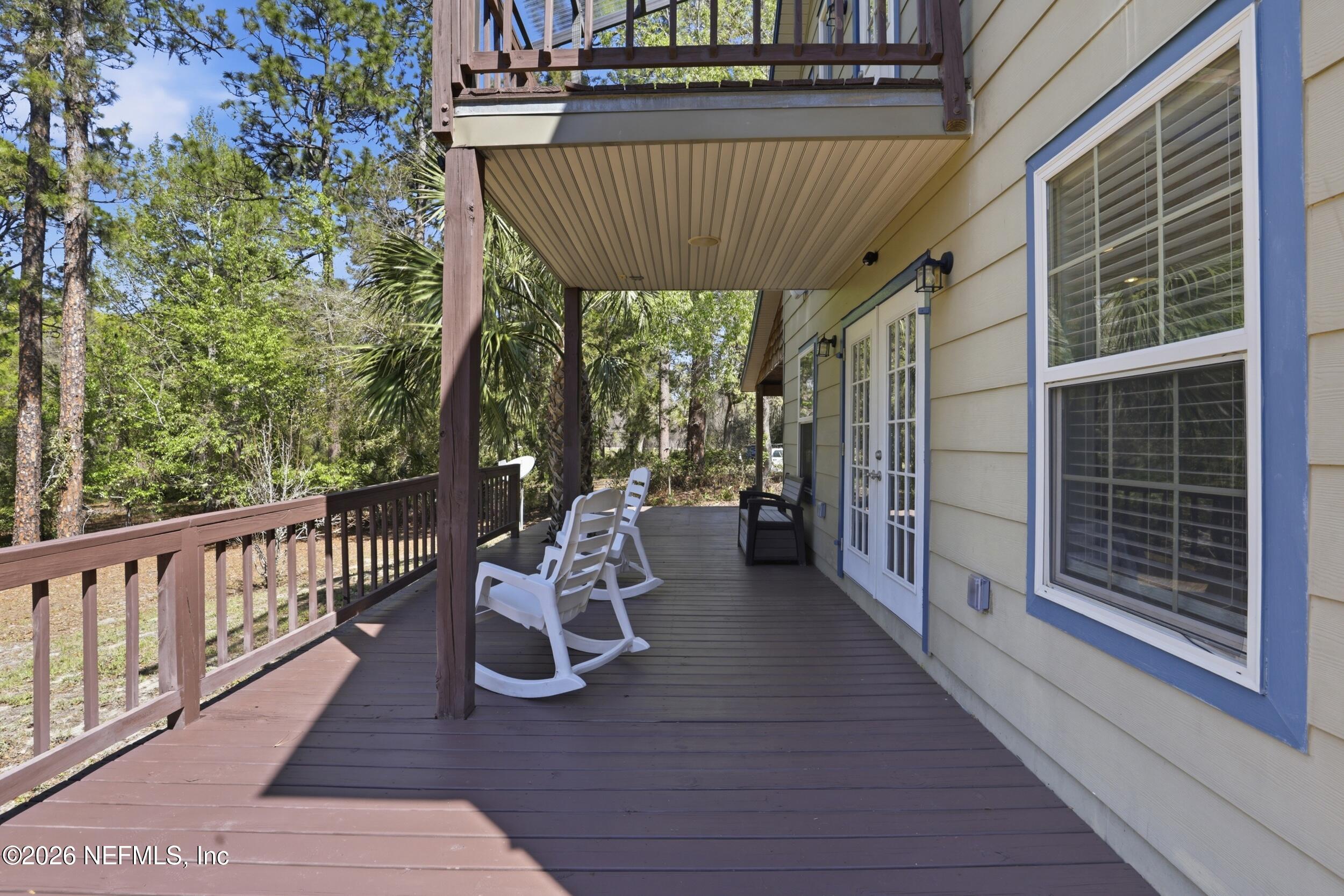 5714 Southeast 4th Avenue Keystone Heights, FL 32656 - Photo 34 of 53 a view of a two chairs in the balcony