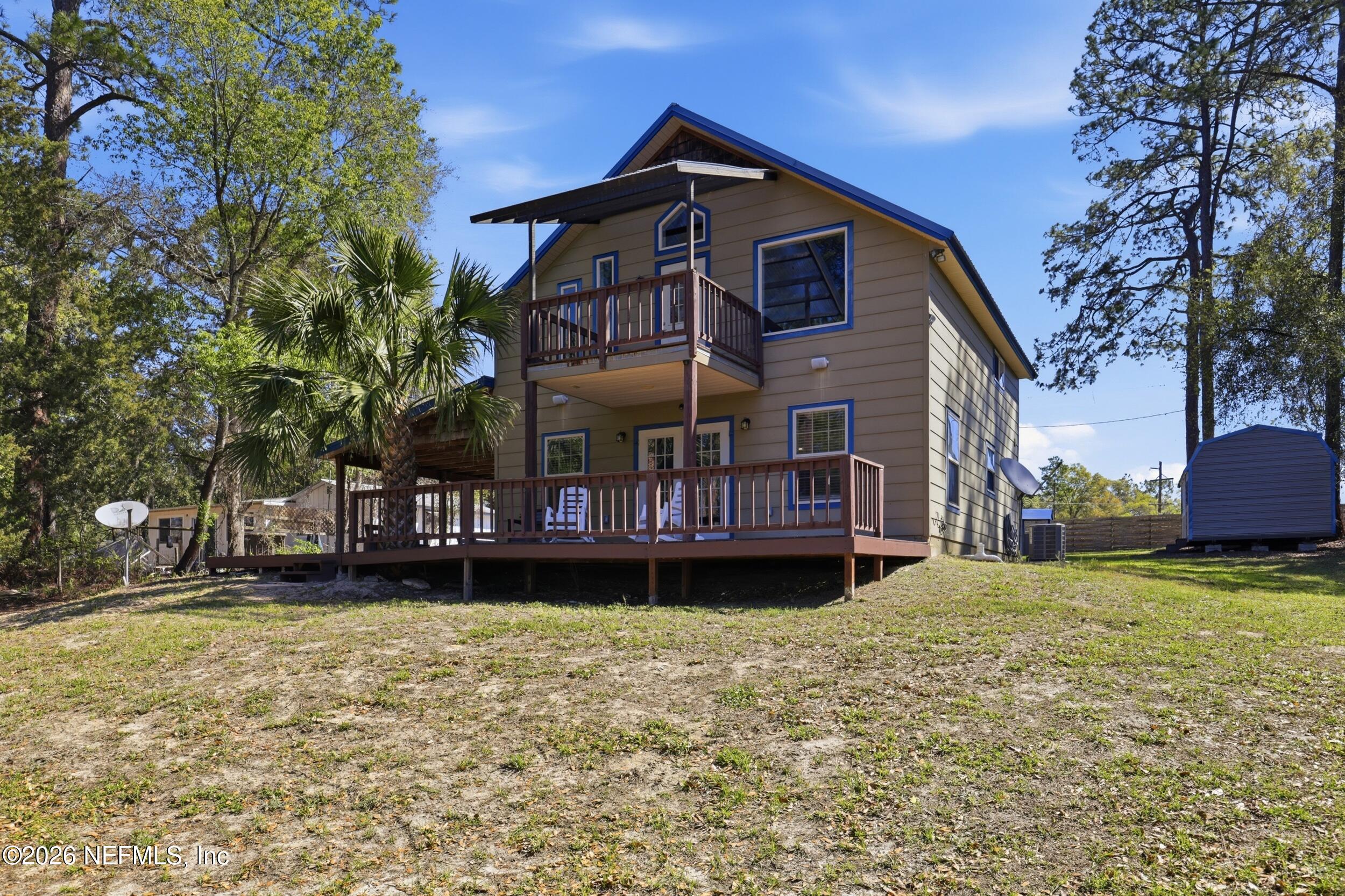 5714 Southeast 4th Avenue Keystone Heights, FL 32656 - Photo 37 of 53 a view of a house with a yard