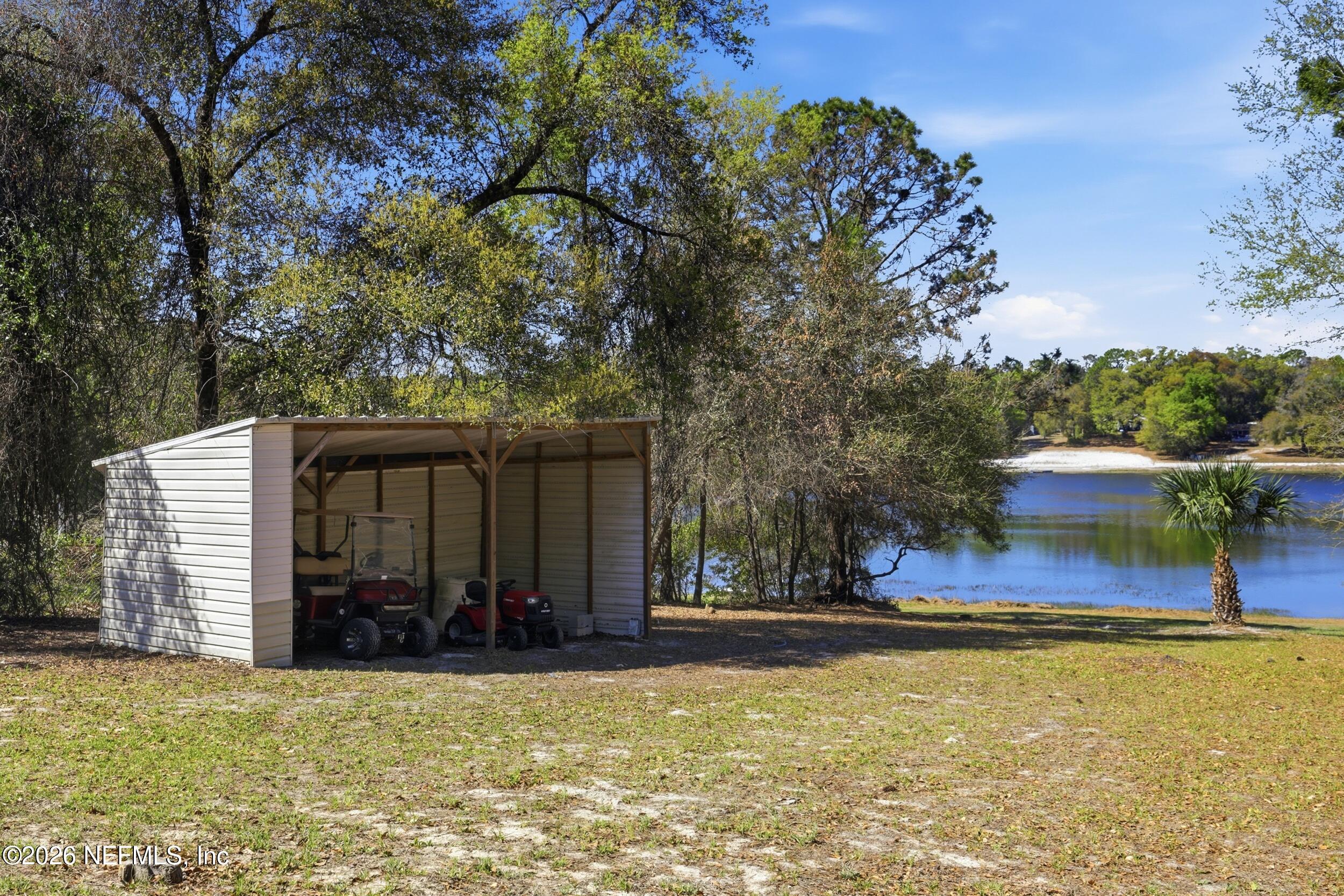 5714 Southeast 4th Avenue Keystone Heights, FL 32656 - Photo 43 of 53 a view of outdoor space yard and porch