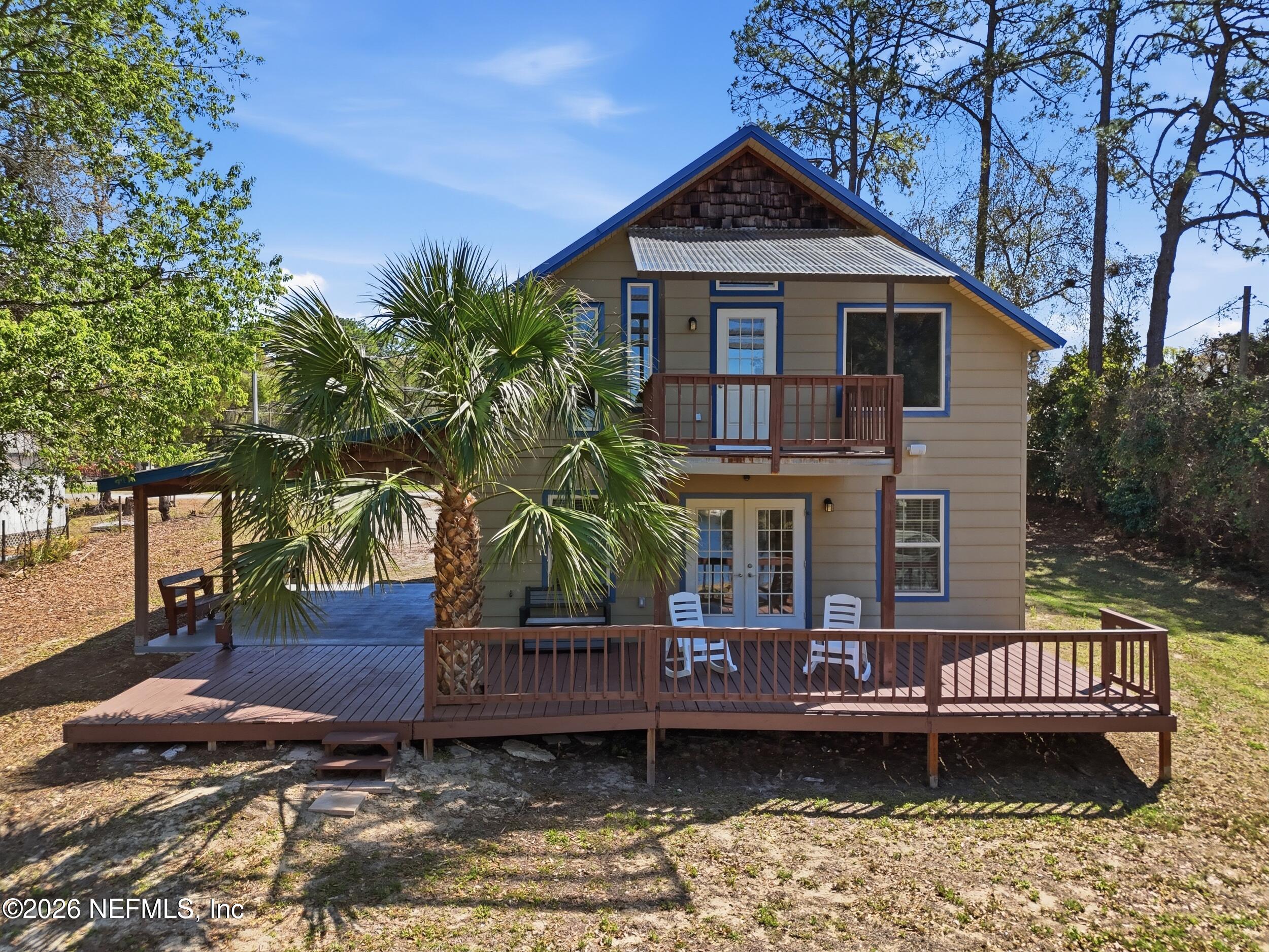 5714 Southeast 4th Avenue Keystone Heights, FL 32656 - Photo 46 of 53 a view of a house with a yard
