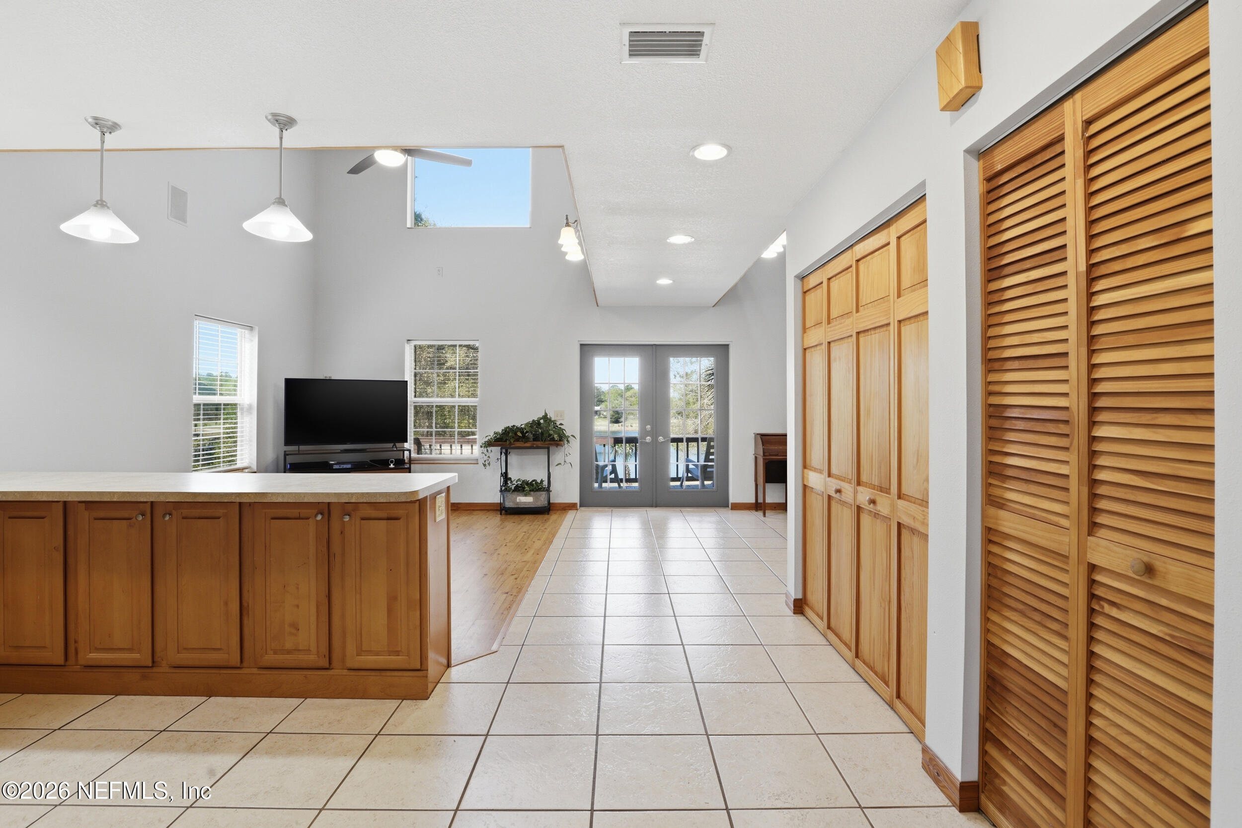 5714 Southeast 4th Avenue Keystone Heights, FL 32656 - Photo 10 of 53 a large kitchen with cabinets and furniture