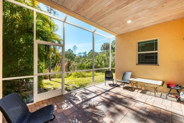 a view of two chairs in the balcony