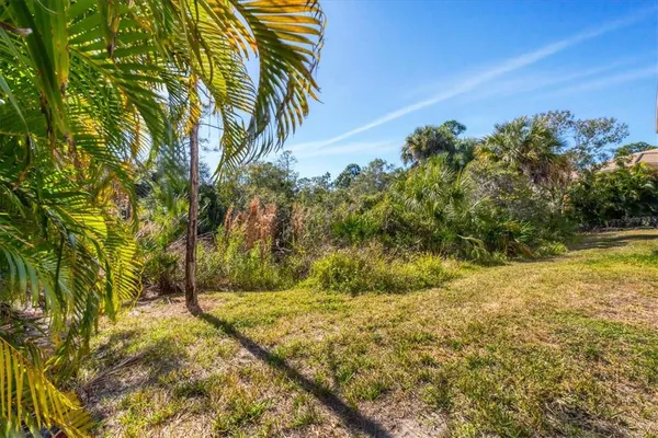 a view of swimming pool with a patio