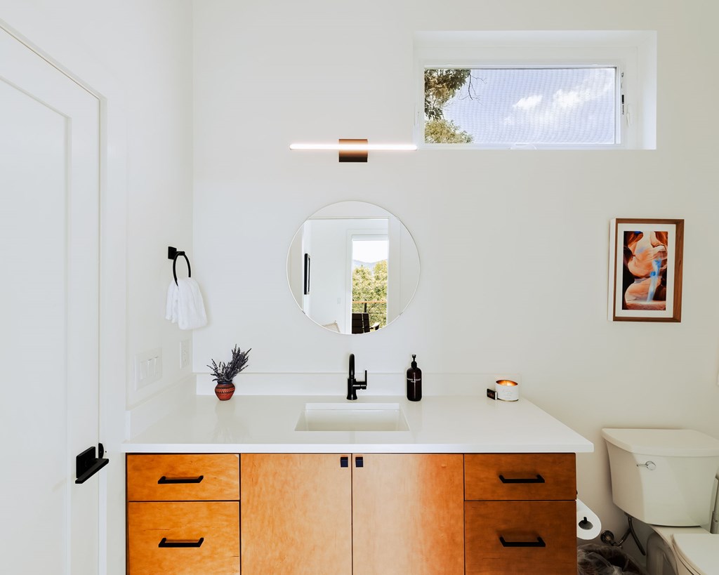 120 Brannon Ridge Young Harris, GA 30582 - Photo 9 of 24 a bathroom with a sink and a mirror