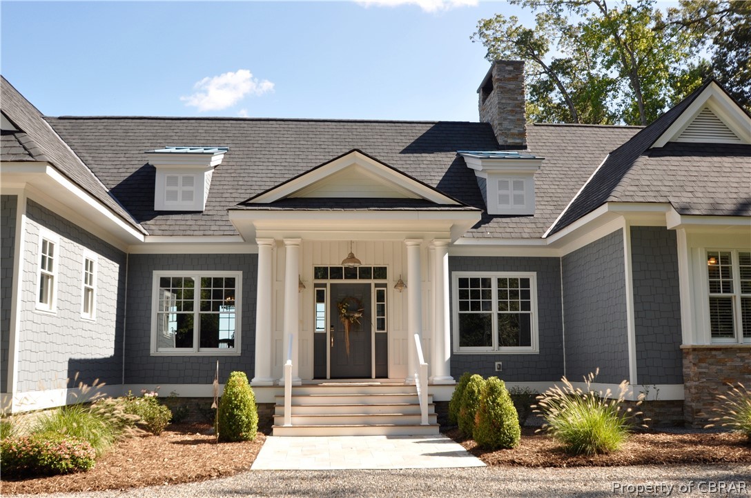 1000 Queenstown Road Lancaster, VA 22503 - Photo 2 of 49 a front view of a house