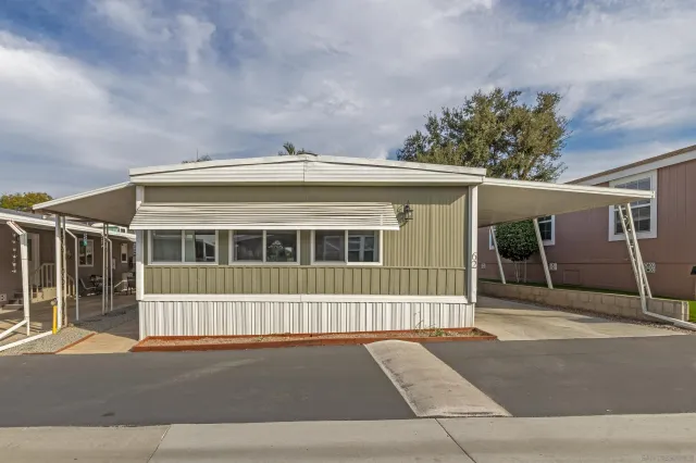 a front view of a house with a garage