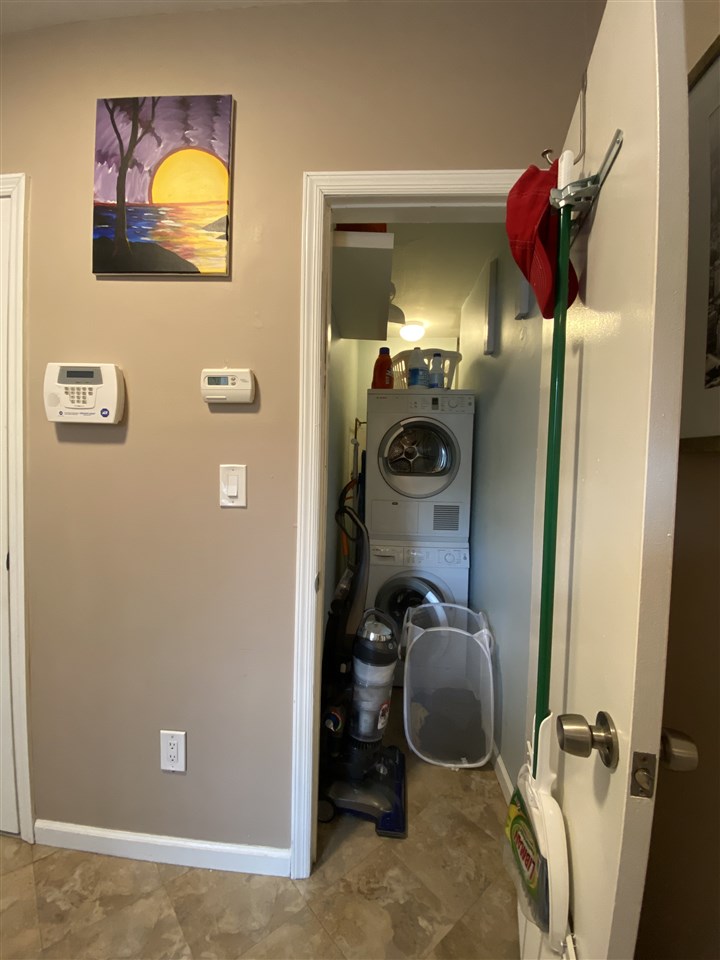 333 Monroe Street, Unit 1A Hoboken, NJ 07030 - Photo 8 of 15 a bathroom with a sink and a mirror
