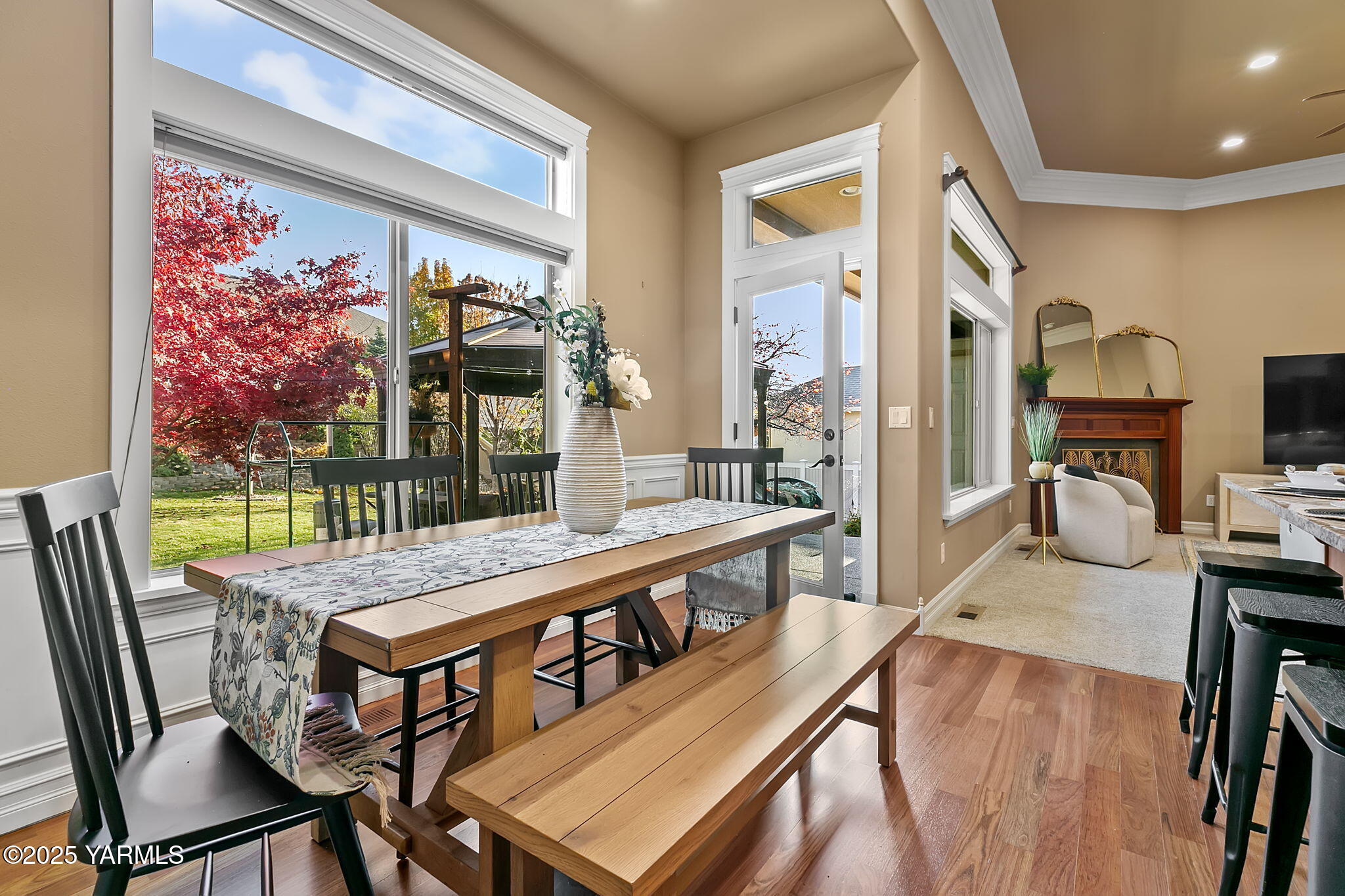 609 North 74th Avenue Yakima, WA 98908 - Photo 20 of 34 a view of a dining room with furniture a chandelier and wooden floor