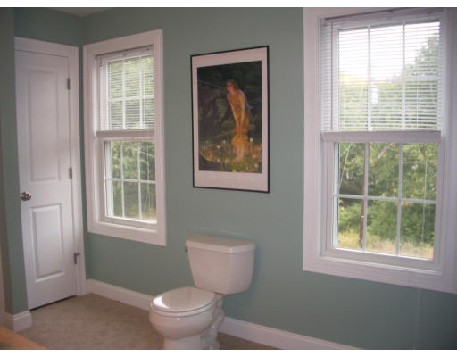 50 Mason Road Freetown, MA 02717 - Photo 4 of 4 a bathroom with a toilet and a window