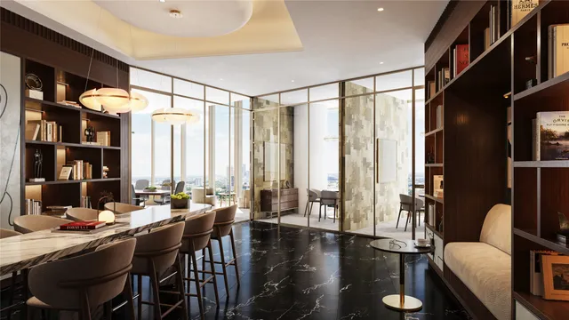 a dining hall with couches a coffee table and chairs with wooden floor