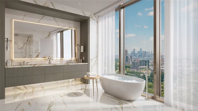 a bathroom with a bathtub and a shower