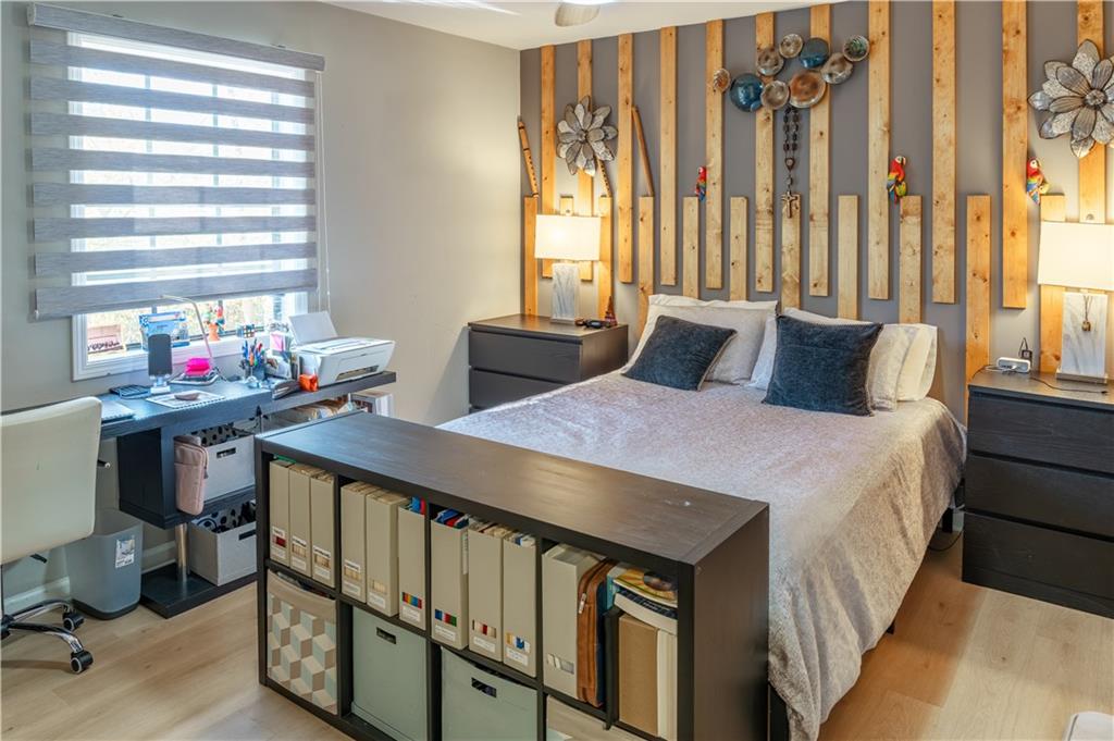 3316 Alcazar Drive Southwest Lilburn, GA 30047 - Photo 15 of 37 a bedroom with furniture and a window