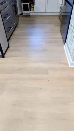 a bedroom with bed and a mirror