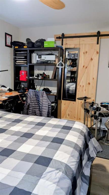 3316 Alcazar Drive Southwest Lilburn, GA 30047 - Photo 30 of 37 a bedroom with bed and a mirror