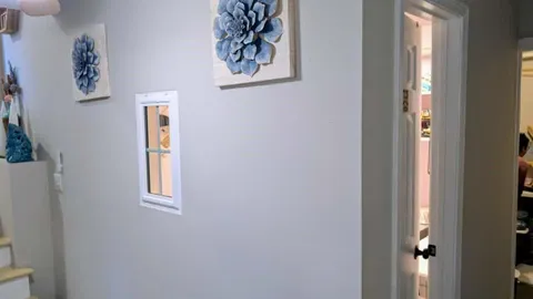 a room with a stove and a sink