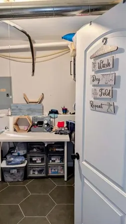 a bathroom with a sink a mirror a vanity and a shower