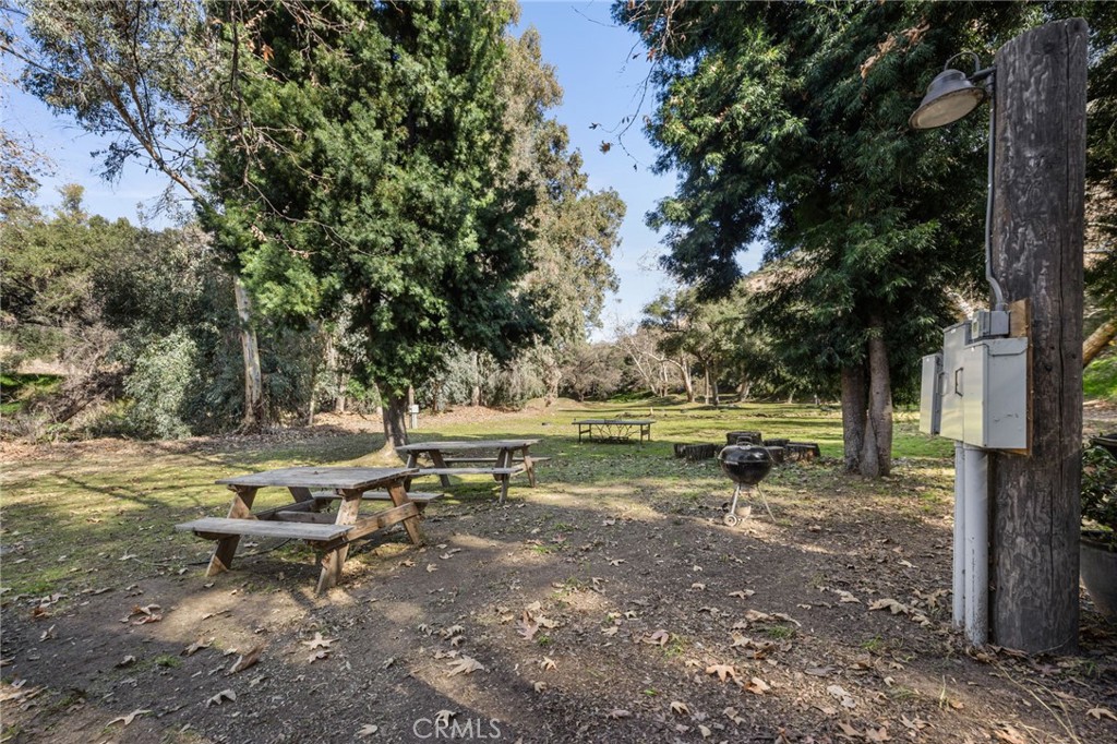 48980 De Luz Road Temecula, CA 92590 - Photo 17 of 50 a view of a lake with outdoor seating