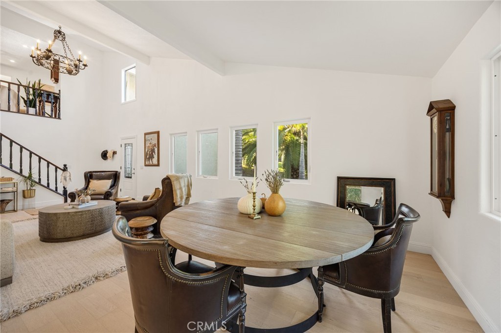 48980 De Luz Road Temecula, CA 92590 - Photo 6 of 50 a view of a dining room with furniture