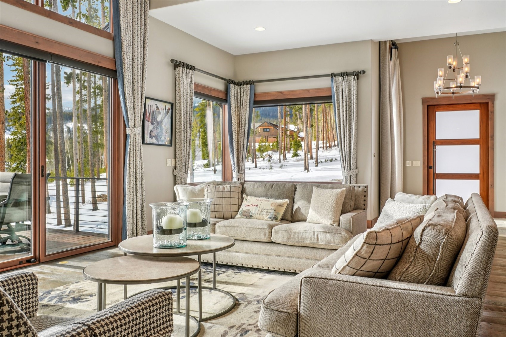60 Barton Ridge Drive Breckenridge, CO 80424 - Photo 12 of 50 Sitting room featuring wood finished floors and a chandelier
