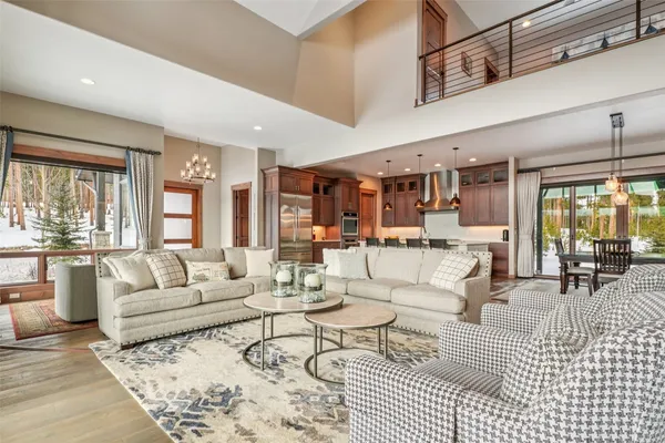 a view of a living room and dining room