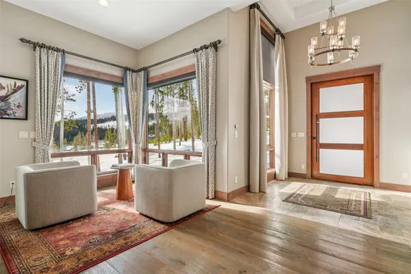 a living room with furniture and windows