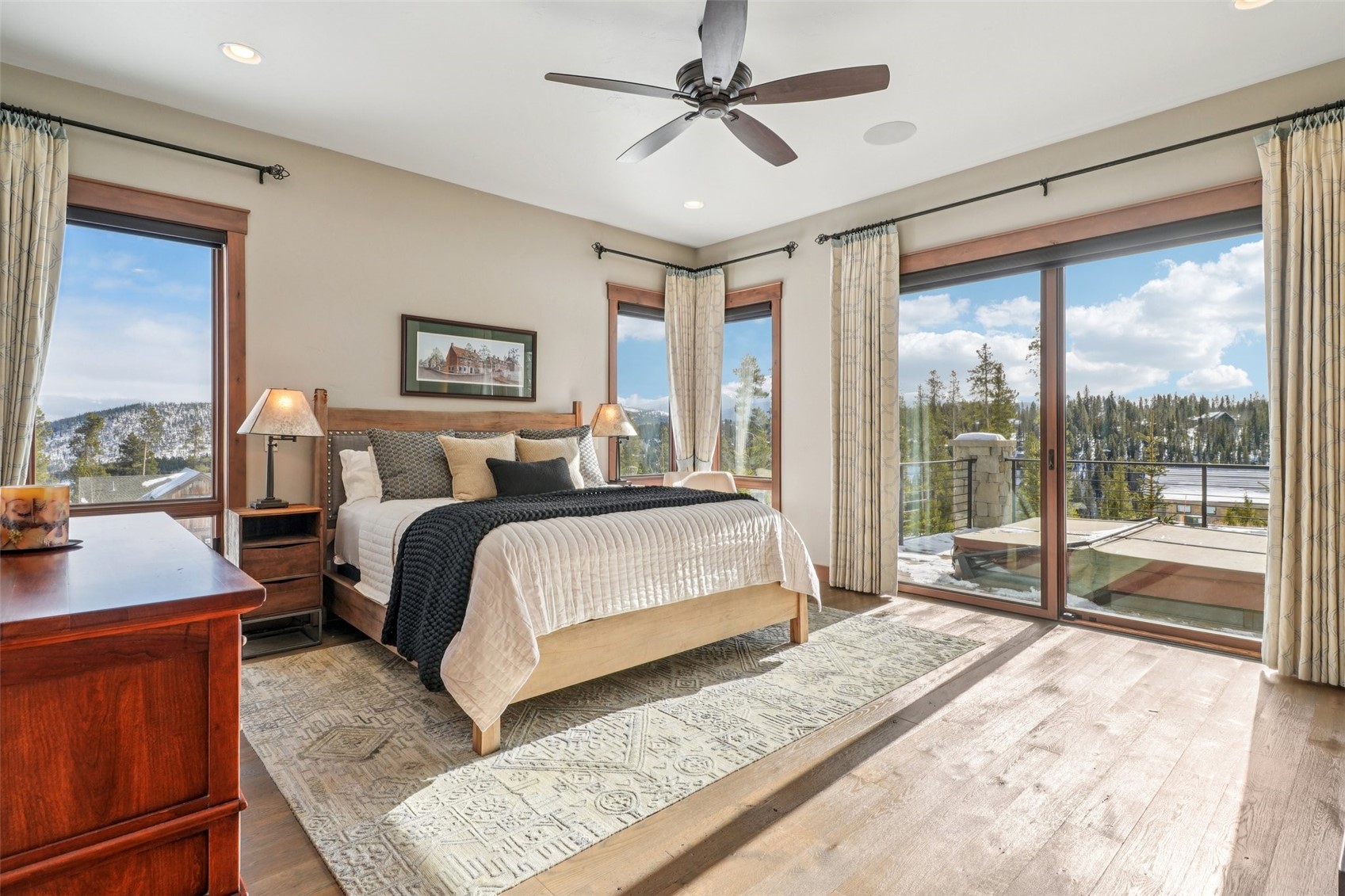 60 Barton Ridge Drive Breckenridge, CO 80424 - Photo 22 of 50 Bedroom with multiple windows, access to exterior, wood-type flooring, a ceiling fan, and recessed lighting