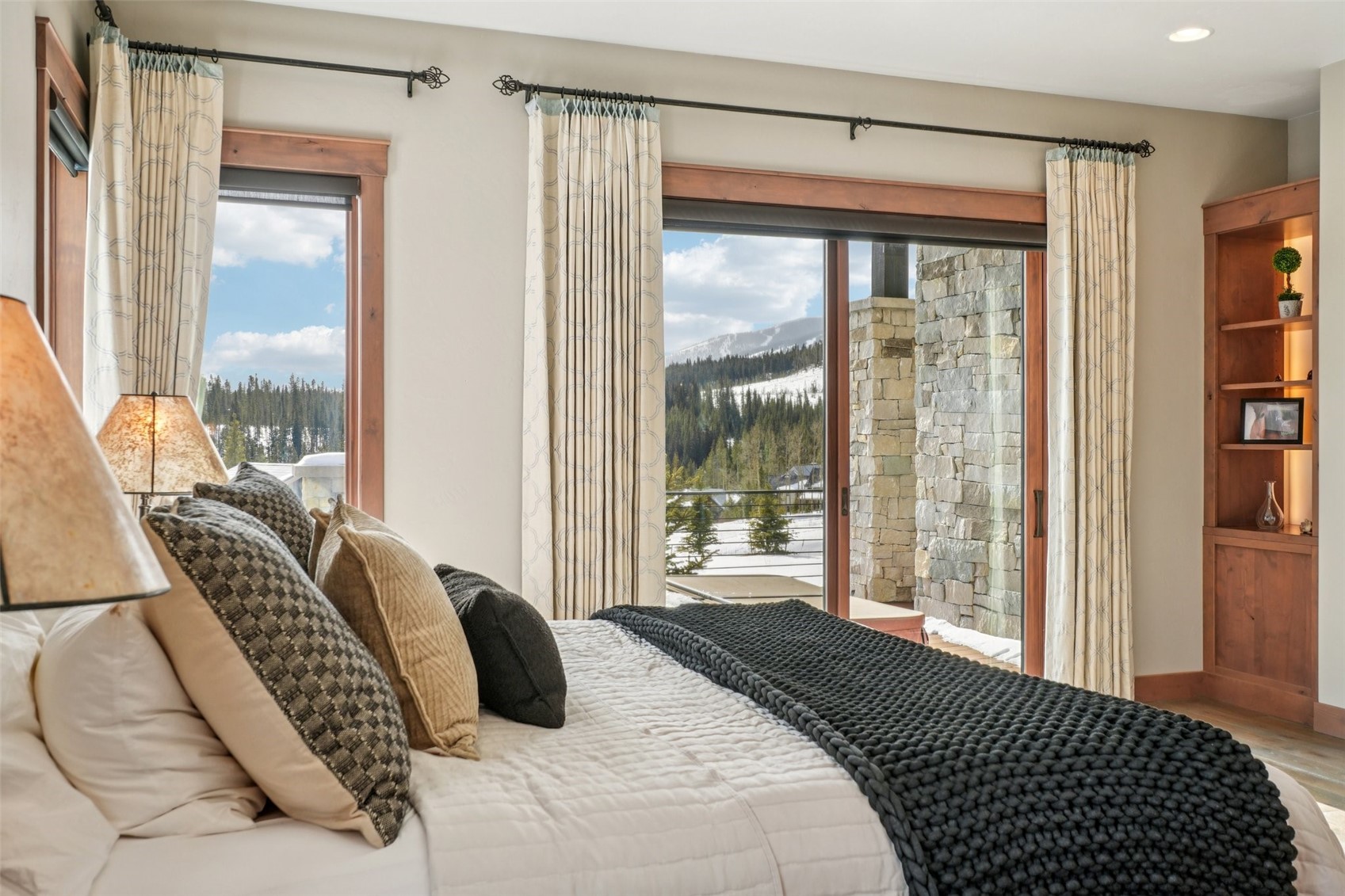 60 Barton Ridge Drive Breckenridge, CO 80424 - Photo 23 of 50 Bedroom featuring access to exterior, wood finished floors, and a mountain view