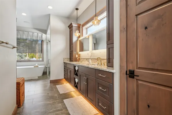 a bath tub sitting next to a window